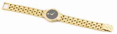 14K Yellow Gold Ladies Diamond Movado Museum Collection Model 77-25-824. 