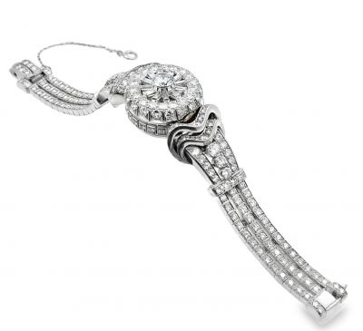 Unique Hidden Crown Covered Platinum and Diamond Watch by PÉRY & FILS for Trabert & Hoeffer-Mauboussin Circa 1950's 
