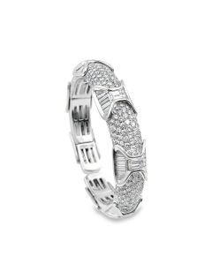 18K White Gold Diamond Bangle Bracelet featuring a semi-ridge design pave set with 196 round, 42 baguette and 3 emerald cut diamonds weighing 15.07Cts, 45Dwt/45Gr., 