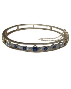 Vintage Diamond and Sapphire Open Frame Bangle Bracelet in 14K Gold and Platinum. 