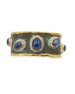 Wide diamond and sapphire cuff bracelet by Victor Velyan.