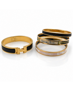Hermès, Collection of Four Enamel and Gold‑Plated Bangles 