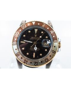 MK Personal Collection This is Rolex GMT Master Two-Tone Root Beer Wristwatch Ref 16753 Circa 1980 